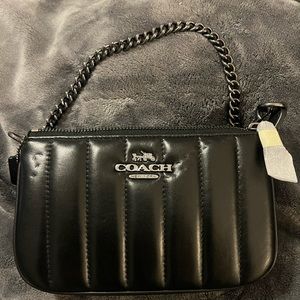 Brand new Coach pouchette with chain.